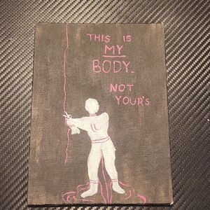 Empowering Canvas Art with Pink and White Design